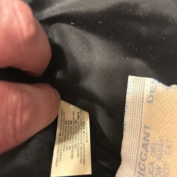 Kate Spade 11” clutch NWT. The only flaw is a small water mark under plastic. - Picture 15 of 16